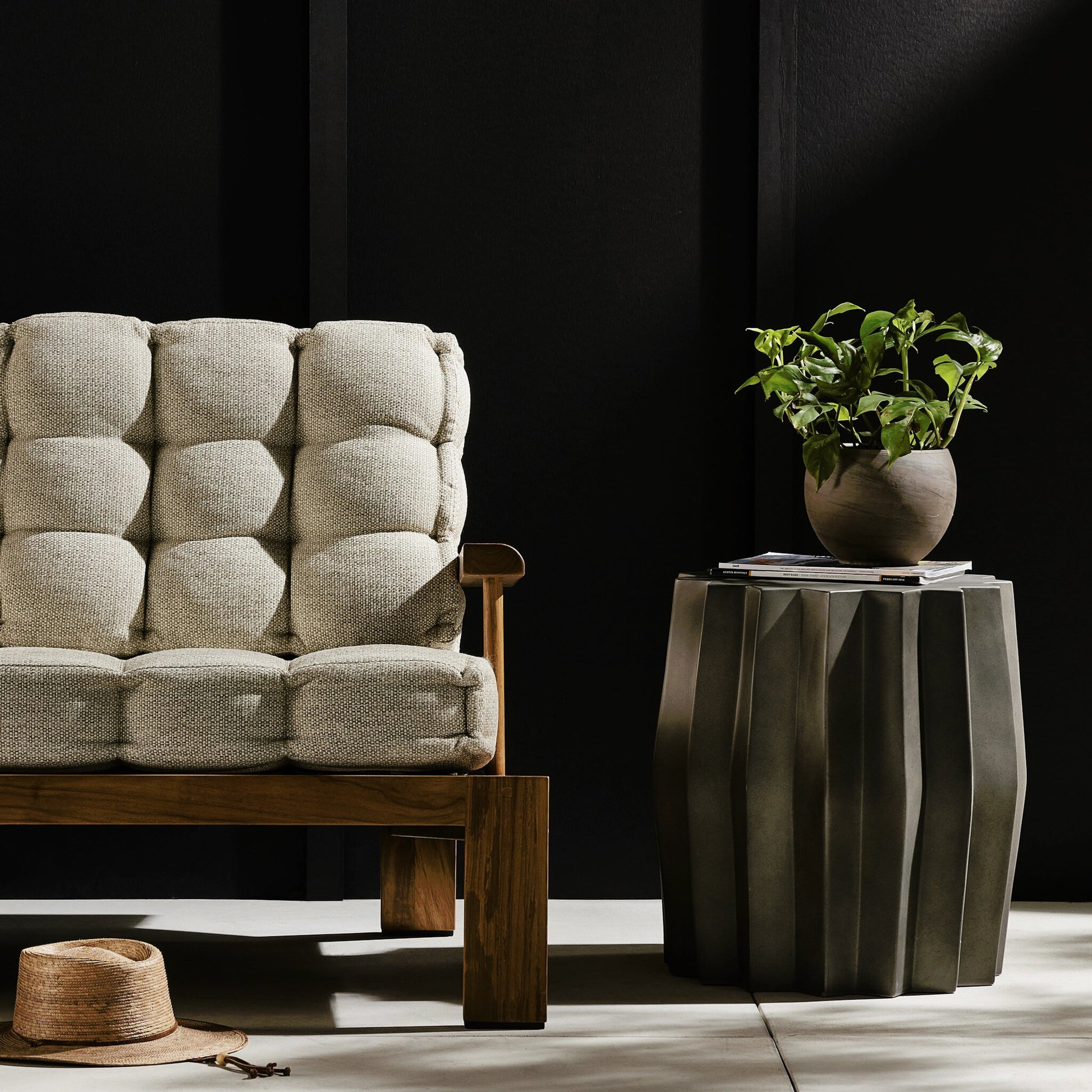 Gem Outdoor End Table by Four Hands. Made from concrete in a modern style.