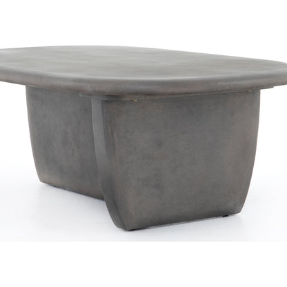 Naya Outdoor Coffee Table by Four Hands in dark grey and dark gray. Made from concrete in a modern style.