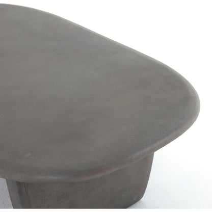 Naya Outdoor Coffee Table by Four Hands in dark grey and dark gray. Made from concrete in a modern style.