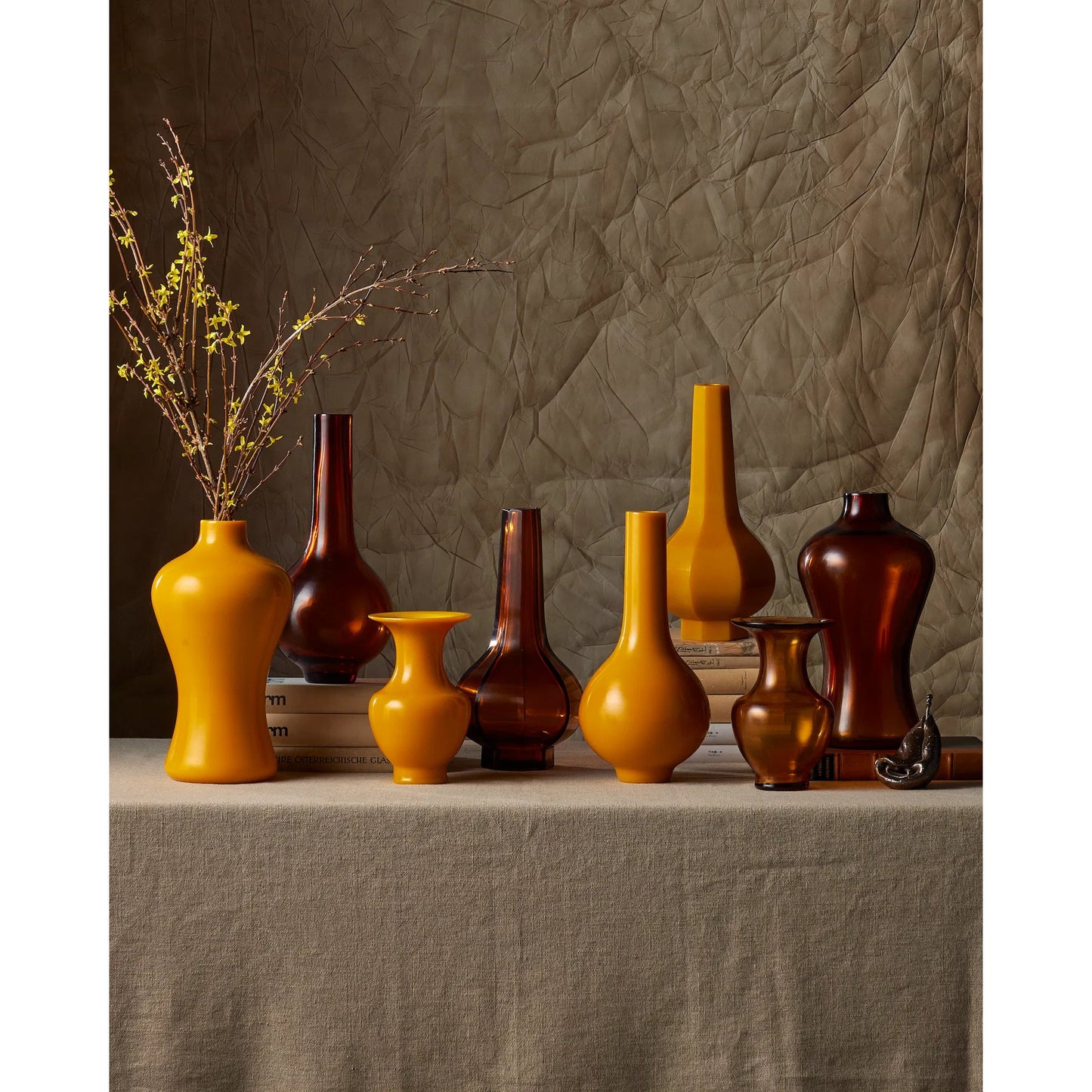 005 SI-2007761 | Lifestyle | Gold Peking Stem Vase by Currey and Company in amber. Made from glass in a modern style.