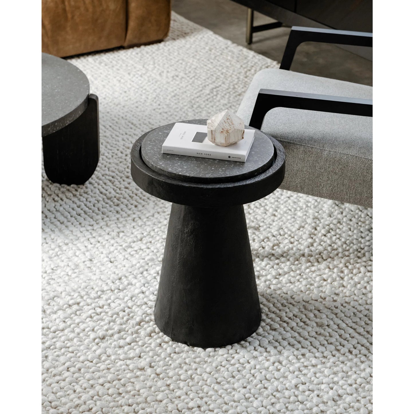 002 SI-2253620 | Lifestyle | Book Accent Table by Moe's Home Collection in black. Made from black terrazzo top, concrete base in a modern style.