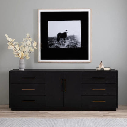 Suki Large Media Console by Four Hands in burnished black. Made from resawn mixed wood, mixed wood solid in a modern style.