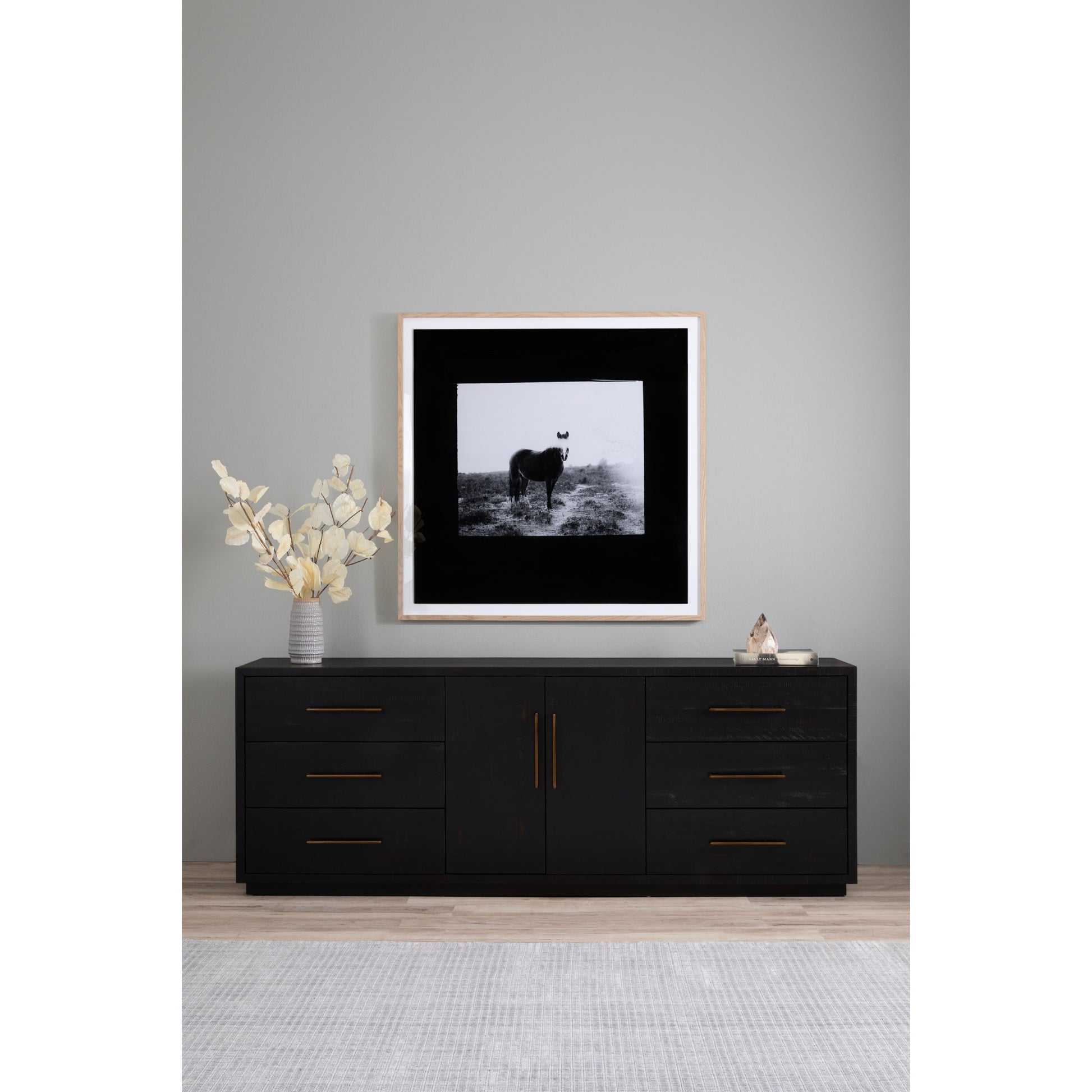 Suki Large Media Console by Four Hands in burnished black. Made from resawn mixed wood, mixed wood solid in a modern style.