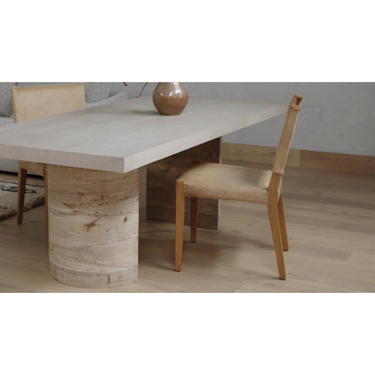 Villa Dining Chair by Four Hands. Made from hair on hide, solid beech, iron in a rustic style.
