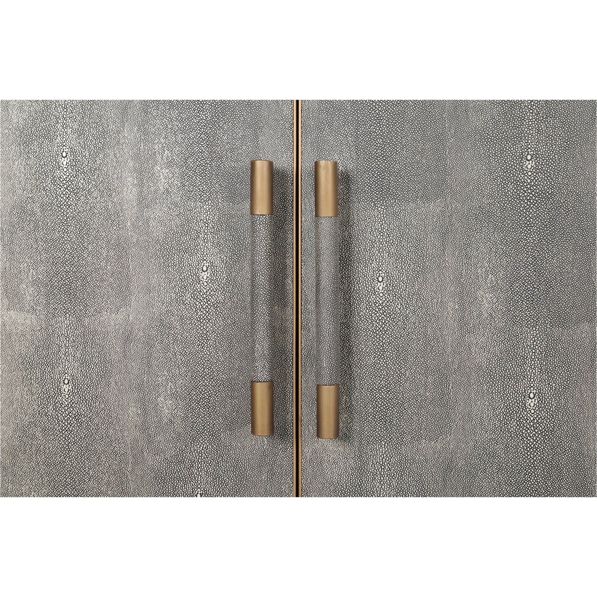 Mako Sideboard by Moe's Home Collection. Made from shagreen patterned polyurethane, solid black oak frame, brass legs, plywood on door, side panel, top panel back panel in a modern style.