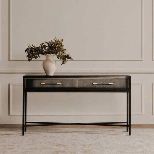 Mako Console Table by Moe's Home Collection in black and black. Made from solid oak in frame, pu leather, metal leg in a unique style.