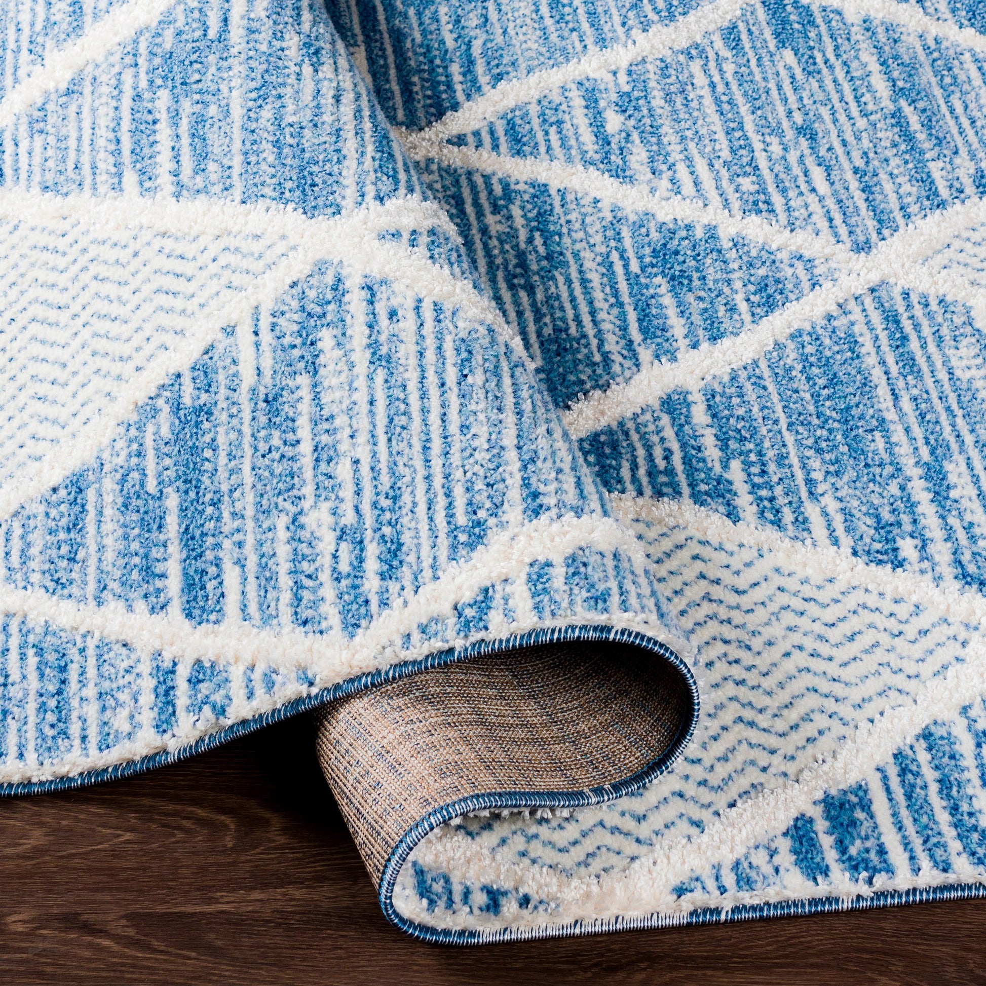 Valencia VLC-2302 Indoor/Outdoor Rug by Livabliss in dark blue, light blue, cream. Made from 70% polyester, 30% polypropylene in a modern style.