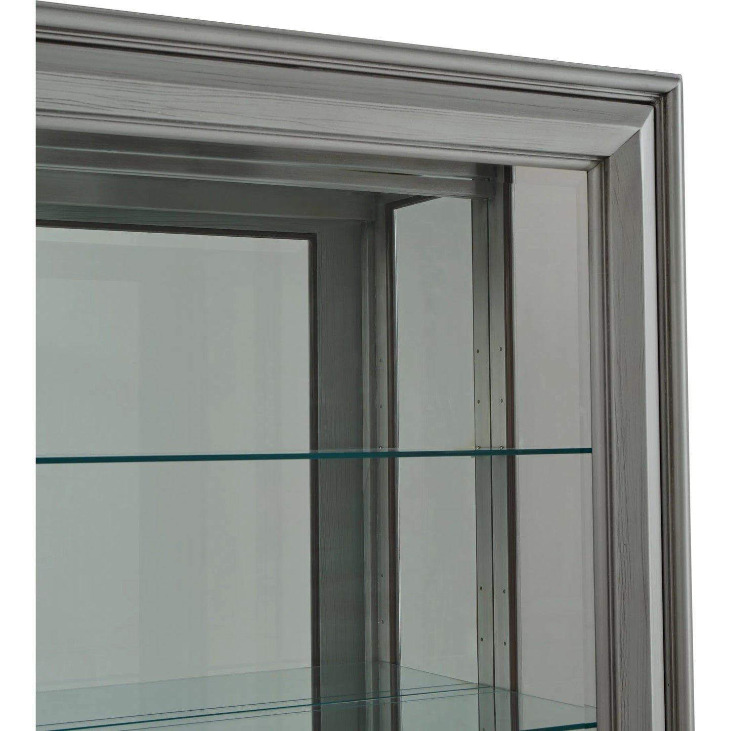 005 SI-2449334 | Closeup | Traditional Sliding Door Curio by Pulaski Furniture in gray. Made from birch wood in a modern style.