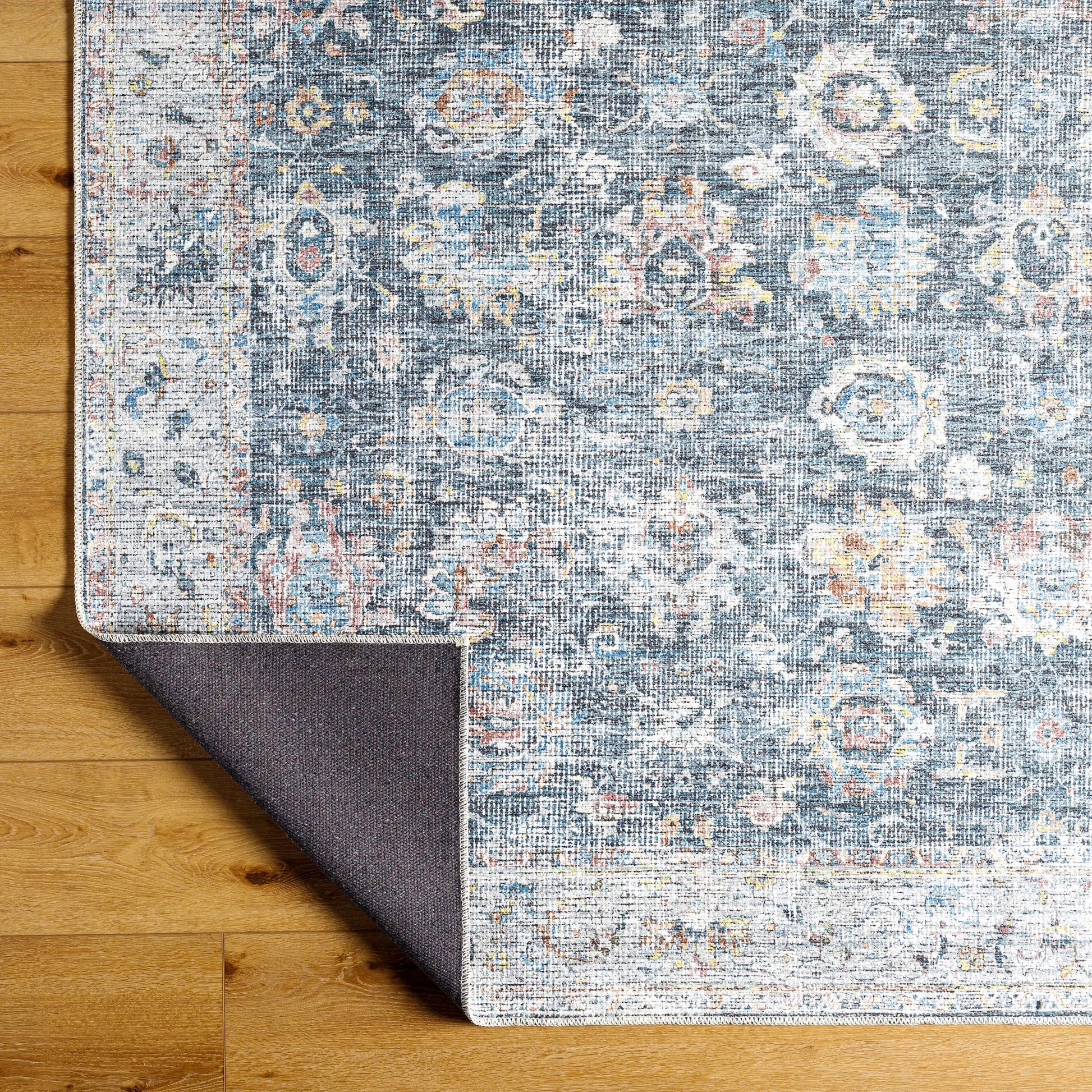 Vinny Rug - 487083 by Livabliss in black, denim, rust, pale blue, grass green, dark brown. Made from face: 100% chenille-polyester, warp: 97% cotton, 3% polyester in a unique style.