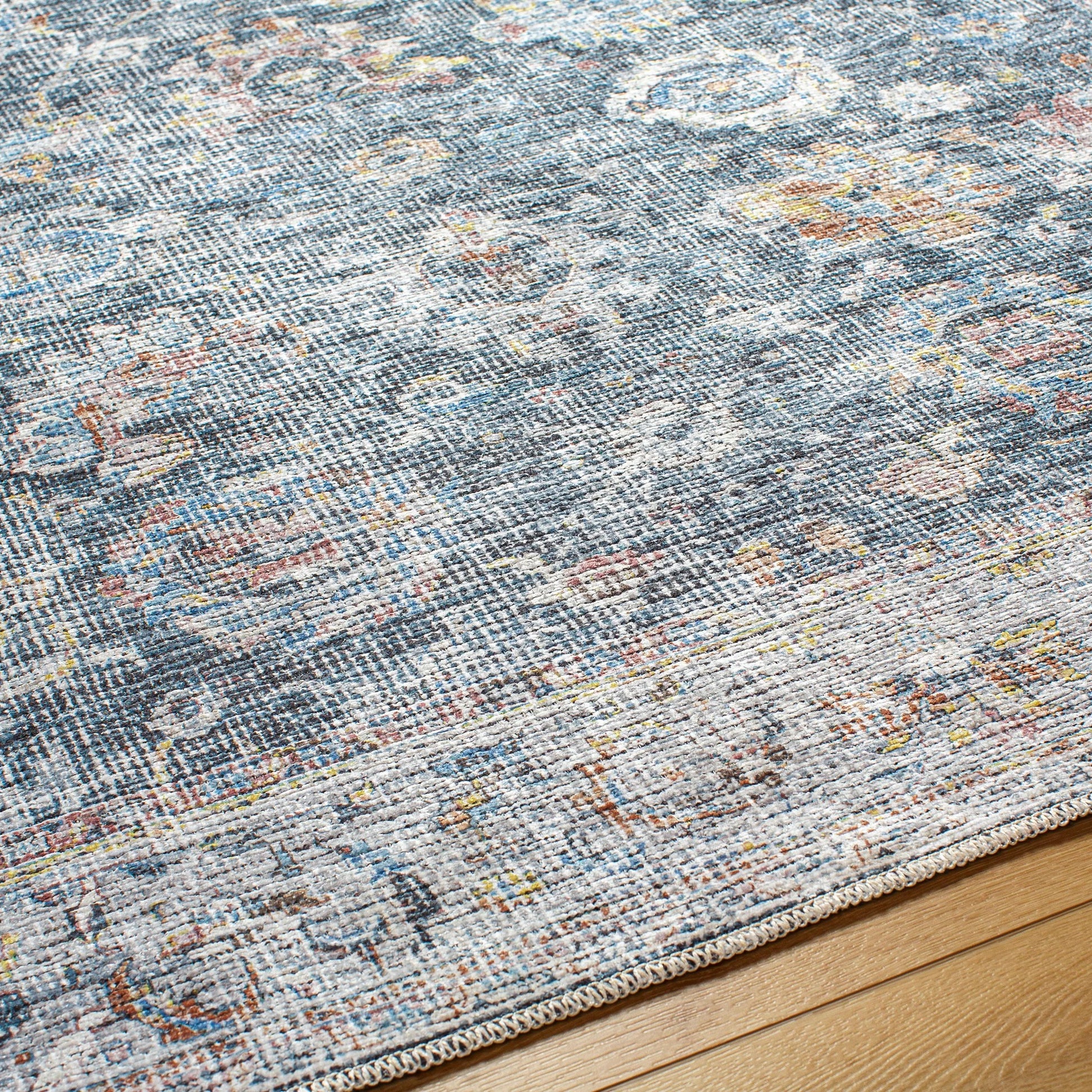 Vinny Rug - 487083 by Livabliss in black, denim, rust, pale blue, grass green, dark brown. Made from face: 100% chenille-polyester, warp: 97% cotton, 3% polyester in a unique style.
