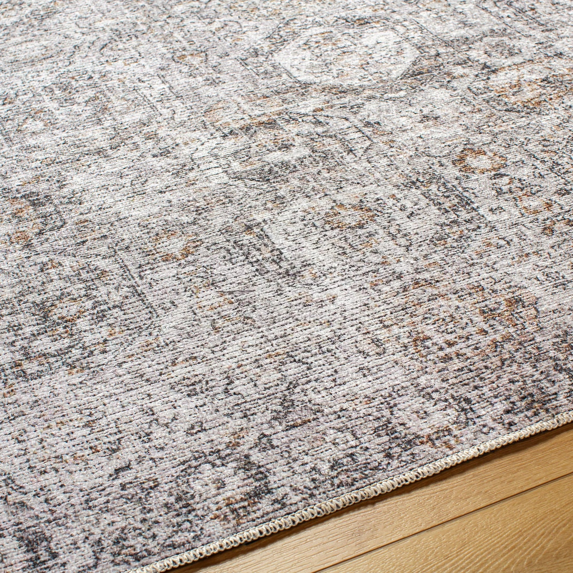 Vinny Rug - 487099 by Livabliss in light gray, black, amber, light beige, gray, white. Made from face: 100% chenille-polyester, warp: 97% cotton, 3% polyester in a unique style.