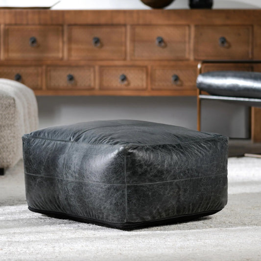 Dexter Genuine Leather Pouf by Villa by Classic Home in black. Made from 100% genuine leather in a traditional style.