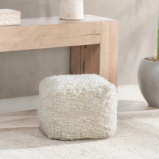 Sinclair Ivory Pouf by Villa by Classic Home in ivory. Made from 90% wool, 10% cotton in a unique style.