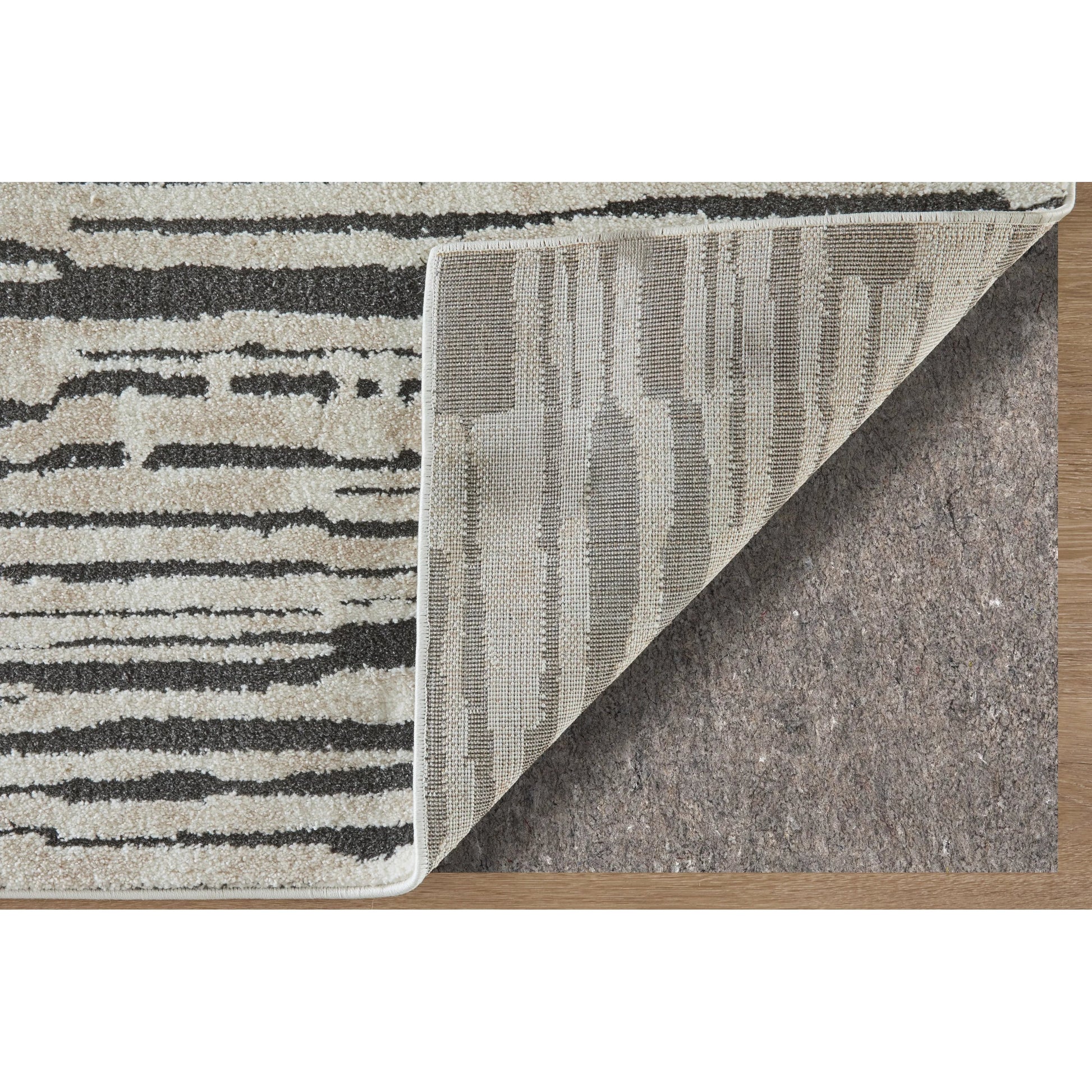 Gilmore Stripes GIL39UPF Rug by Feizy in ivory, black. Made from polypropylene in a unique style.