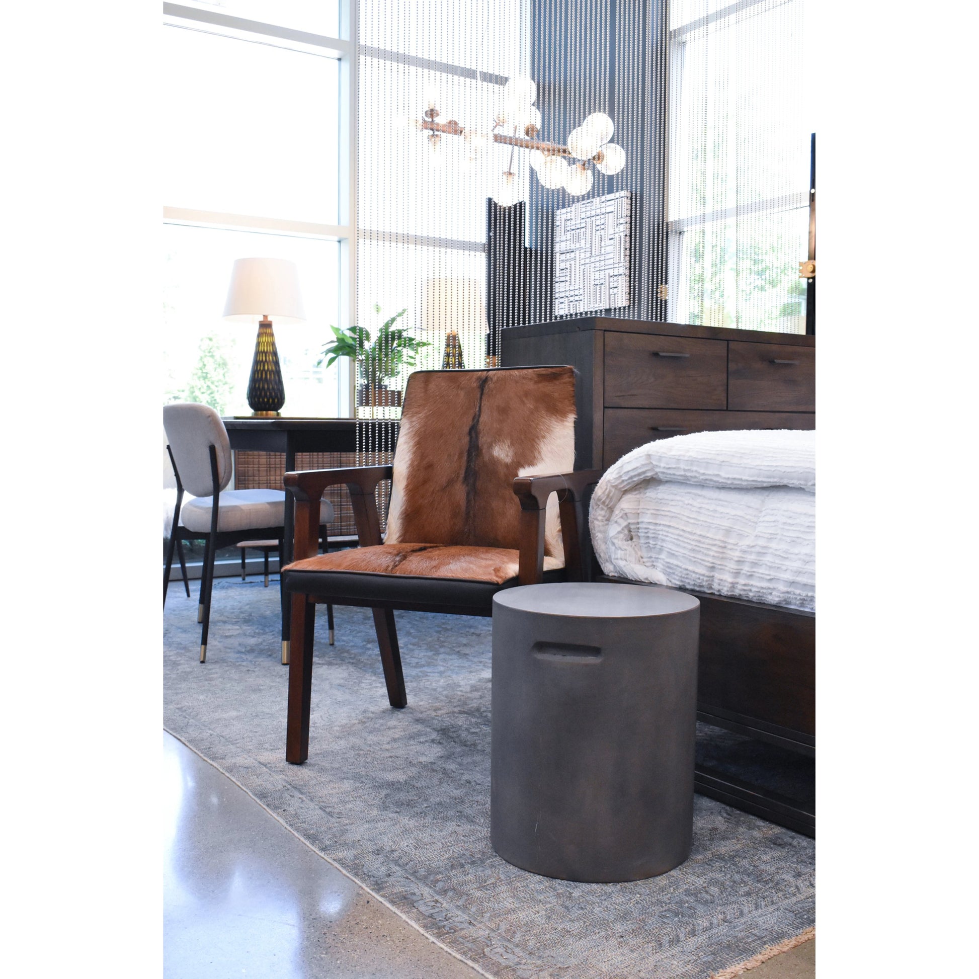 Concrete Round Side Table With Handle by LH Imports in grey. Made from dark grey concrete in a modern style.