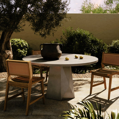 Bowman Outdoor Dining Table by Four Hands. Made from unique in a modern style.