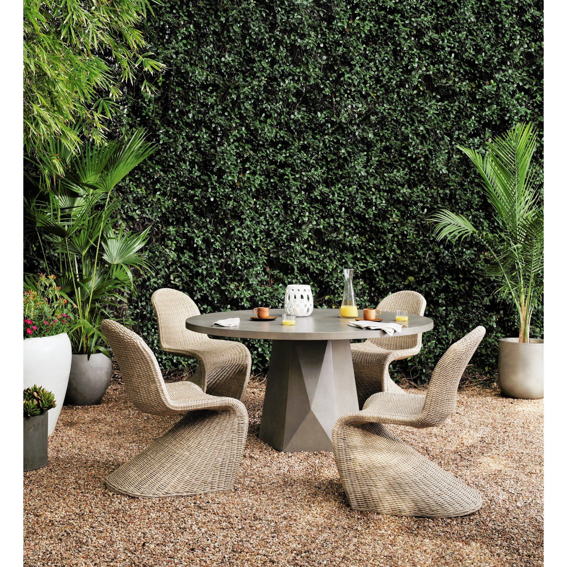 Bowman Outdoor Dining Table by Four Hands. Made from unique in a modern style.