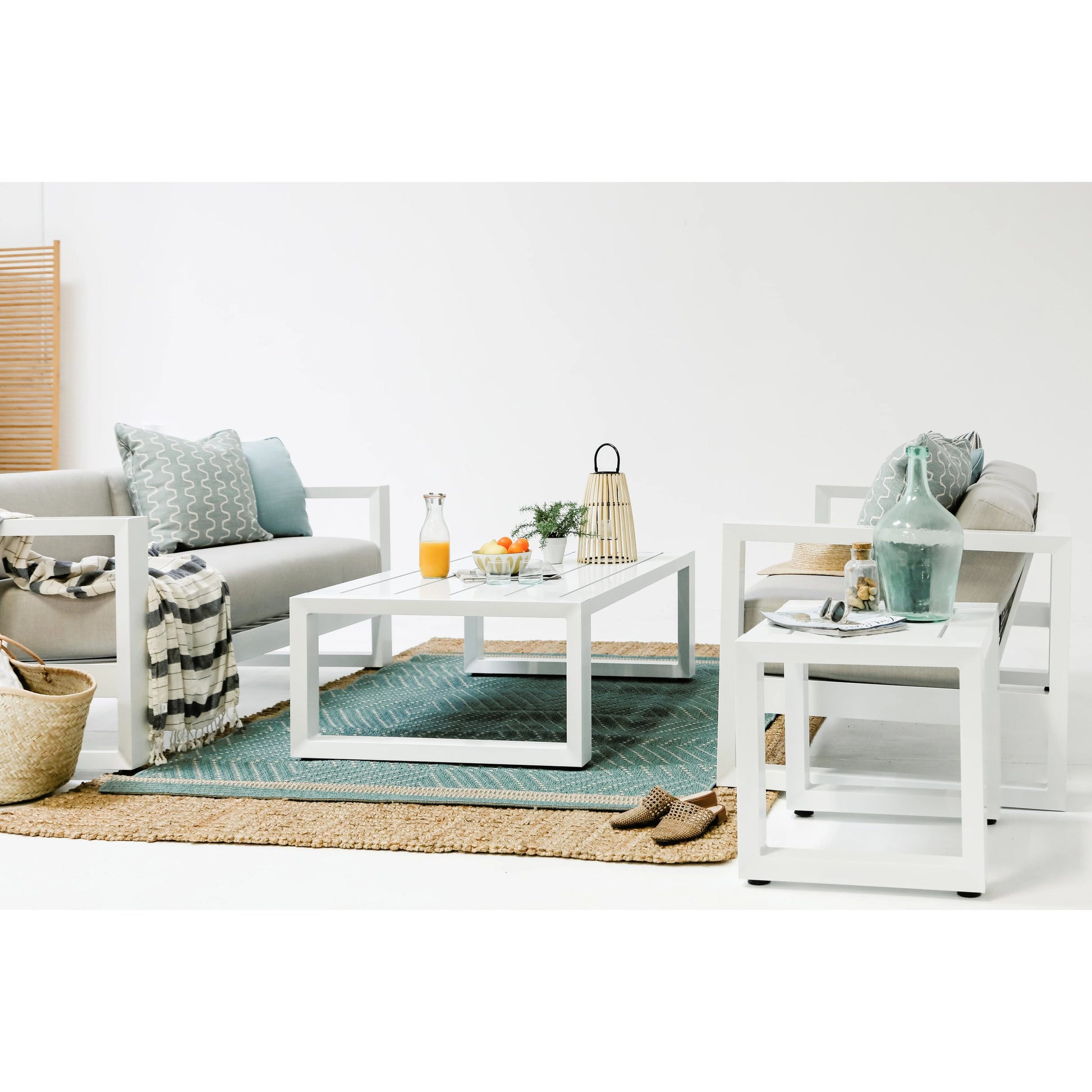 Newport Outdoor End Table by Sunset West in frost. Made from aluminum in a modern style.