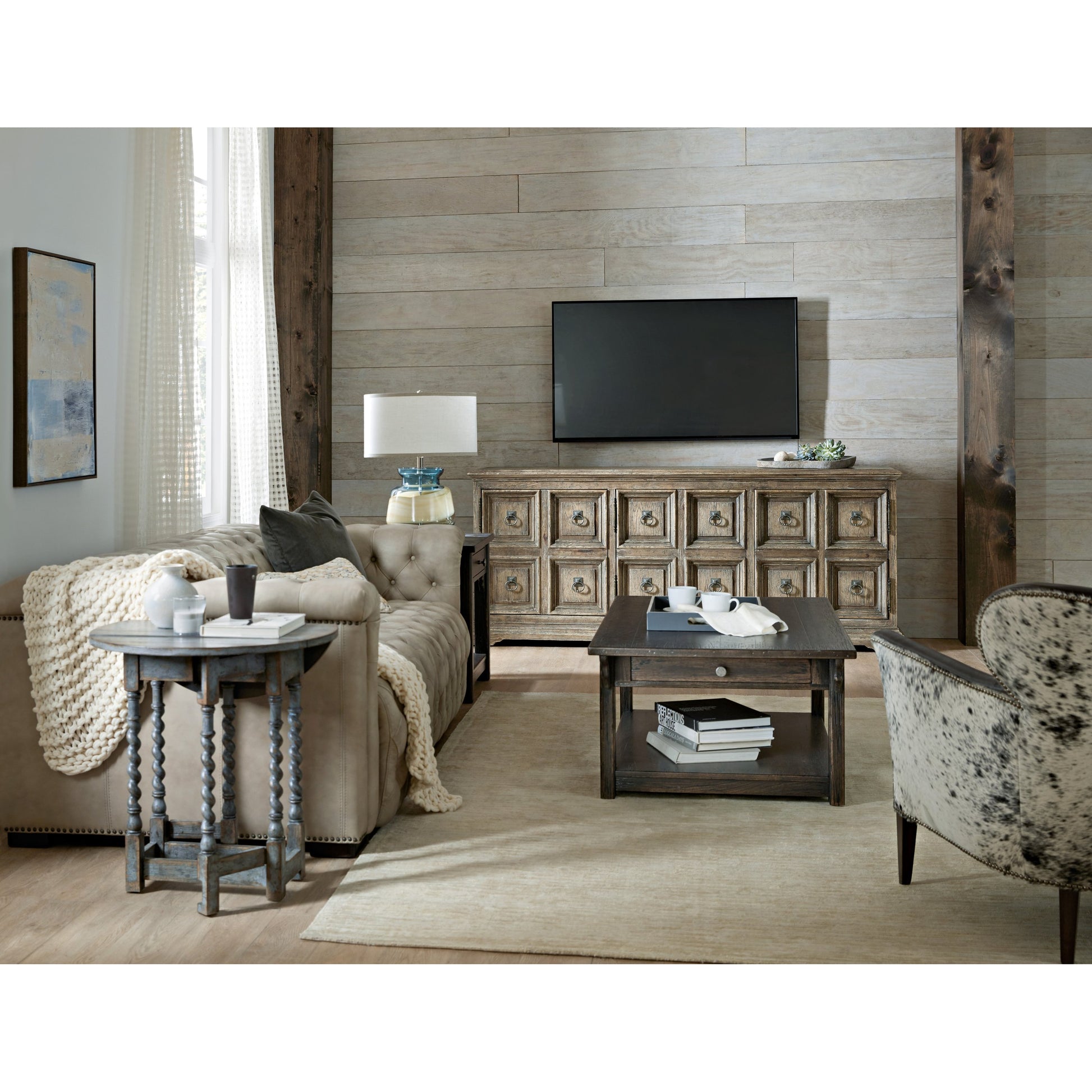 La Grange Prause Gate Leg Round Table by Hooker Furniture in blue bonnet. Made from pecky hickory veneer, solid-wood edge top in a unique style.