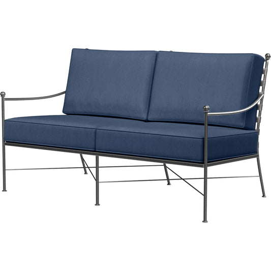 Provence Outdoor Loveseat by Sunset West. Made from wrought iron in a modern style.