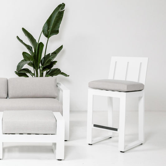 Newport Outdoor Counter Stool by Sunset West in frost. Made from aluminum in a modern style.