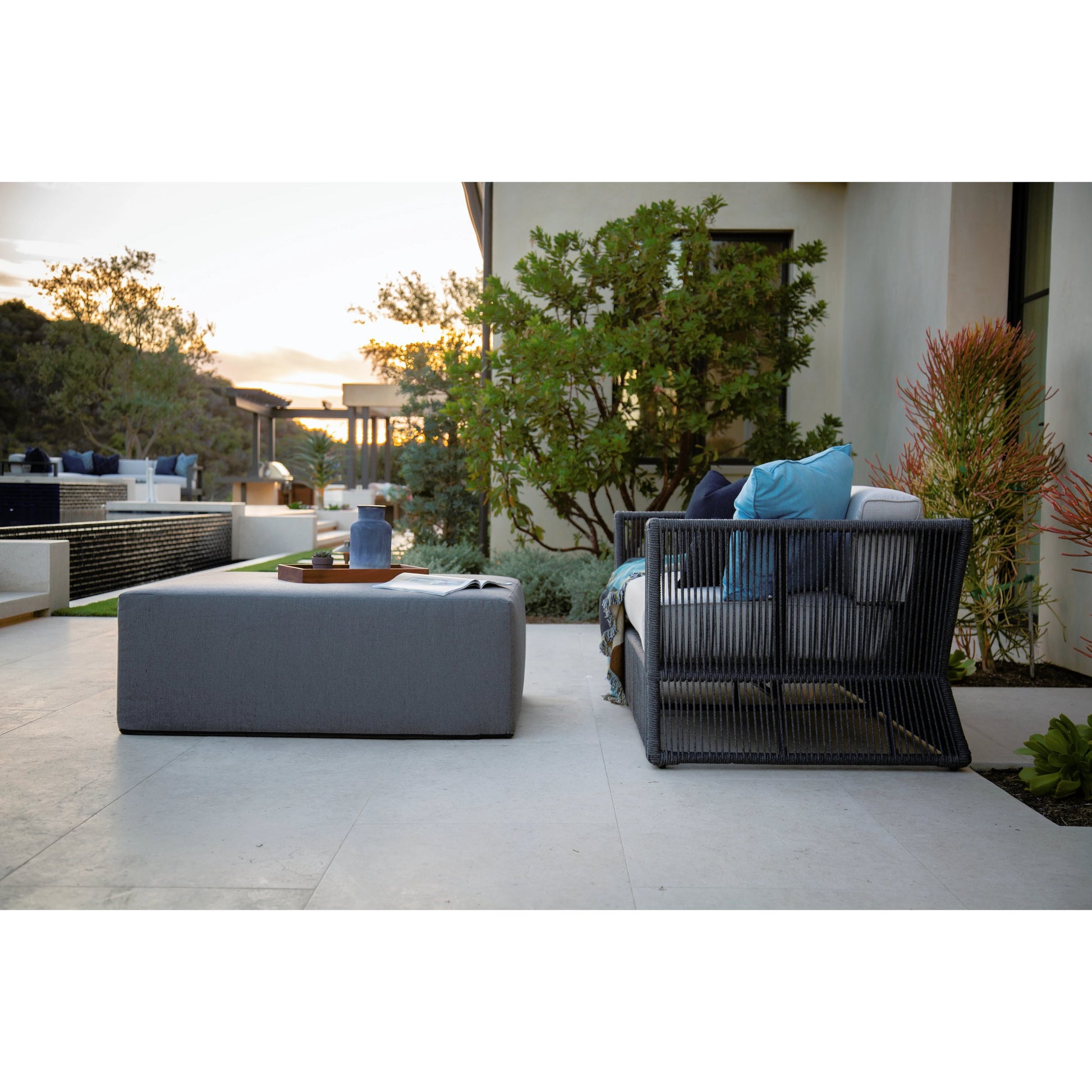 Milano Outdoor Sofa by Sunset West in slate. Made from olefin rope in a coastal style.