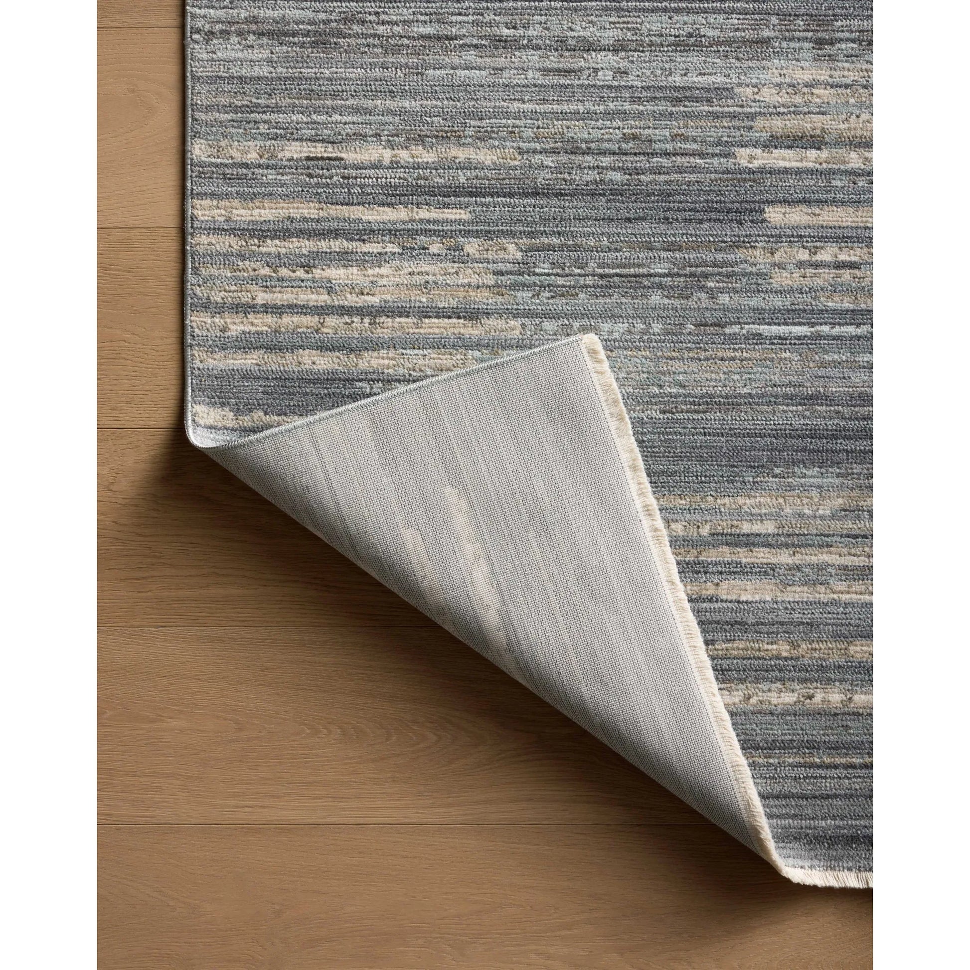 Wade WAE-02 Rug by Loloi in ocean, sand. Made from 100% polyester in a unique style.