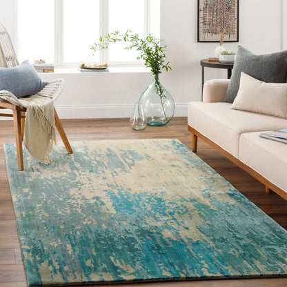 Watercolor Rug - 21179 by Surya in teal, light sage, light gray, taupe, medium gray, sky blue. Made from 100% wool in a unique style.