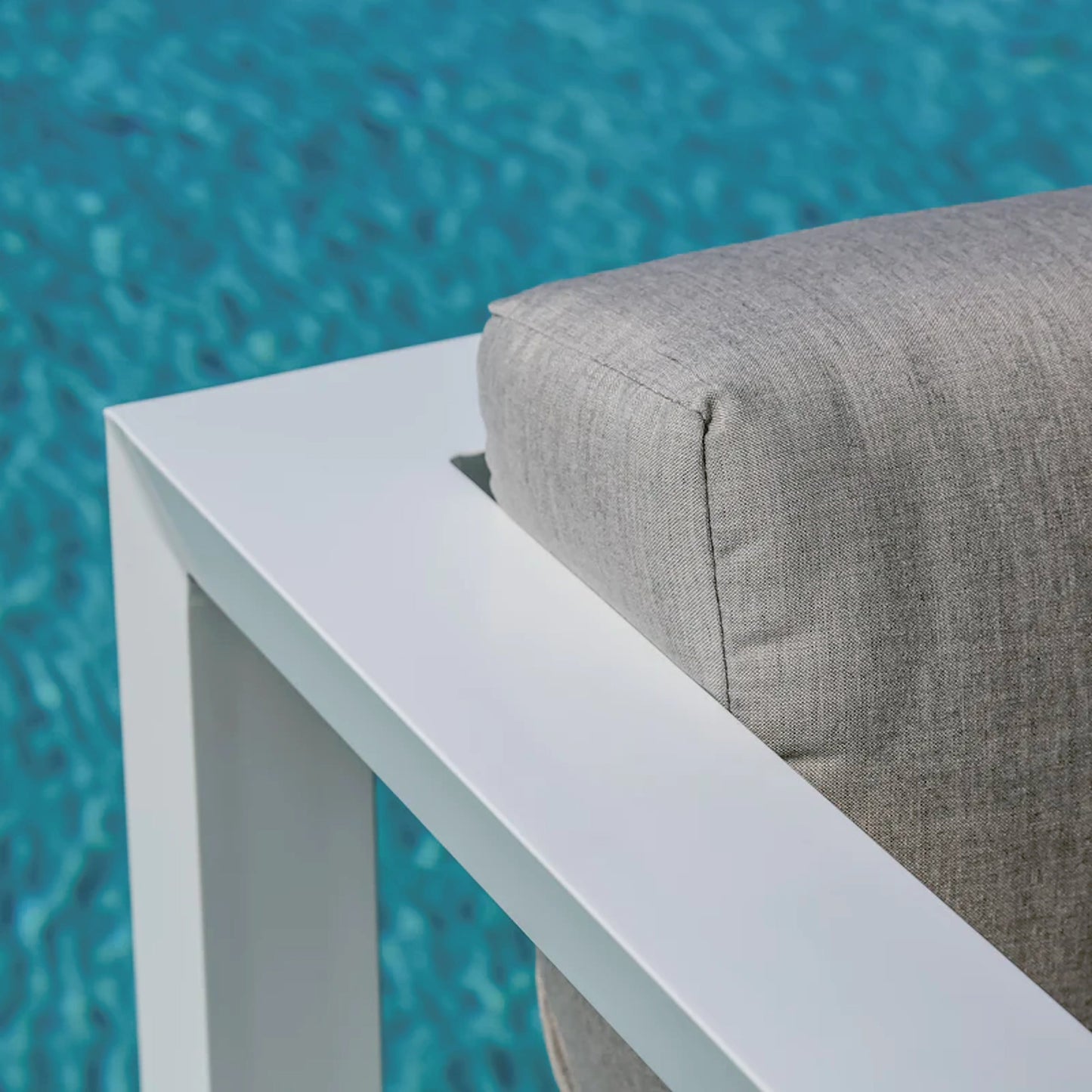 004 SI-2167153 | Closeup | Newport Outdoor Sectional by Sunset West in frost. Made from aluminum in a modern style.