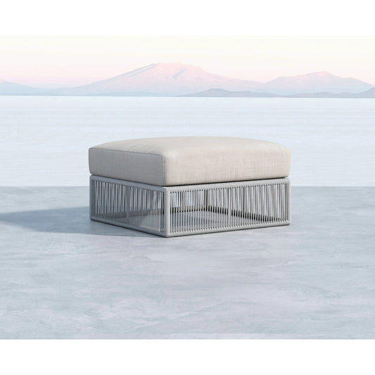 Miami Outdoor Ottoman by Sunset West in frost. Made from olefin rope in a coastal style.