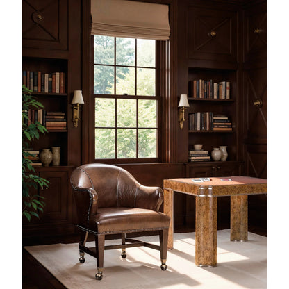 Archives Game Table by Hooker Furniture in amber faux-tortoise shell. Made from leather, hair on hide leather, birch veneers, metal in a traditional style.