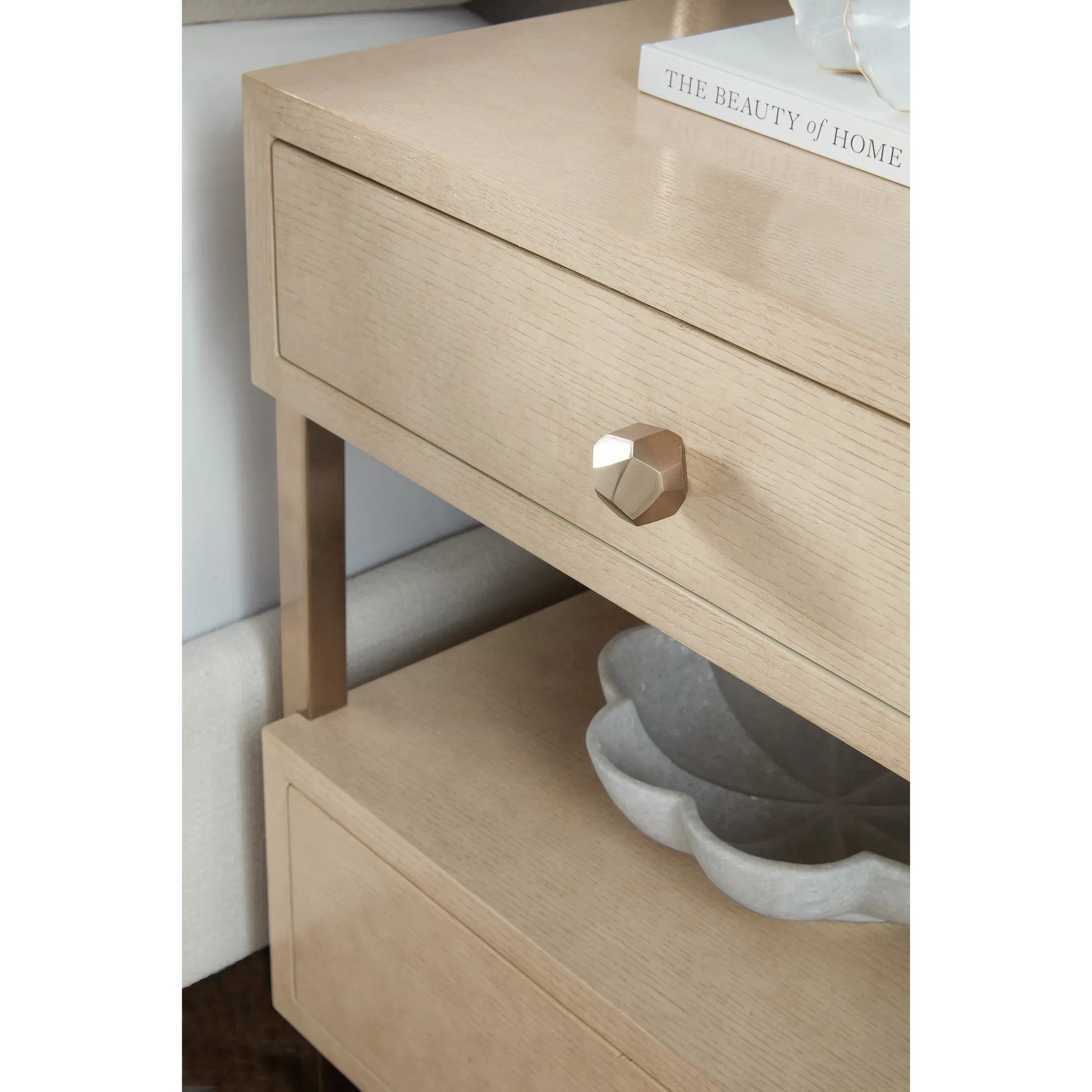 Westwood Two-Drawer Nightstand by Hooker Furniture in light wood and polished limestone. Made from oak veneers, metal in a transitional style.