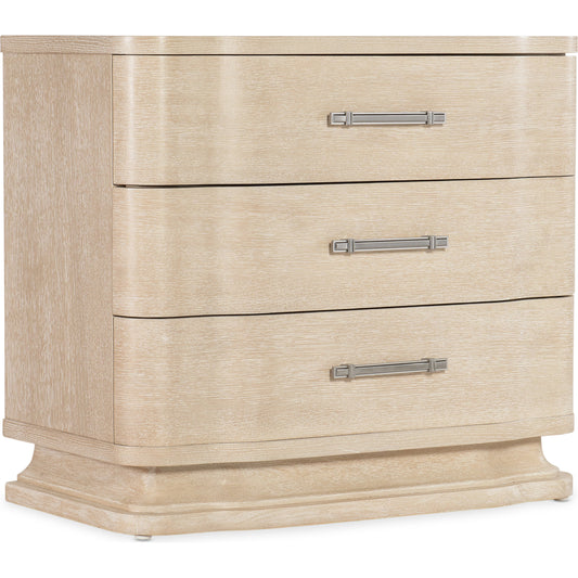 Nouveau Chic Three Drawer Nightstand by Hooker Furniture in sandstone. Made from oak veneers in a modern style.