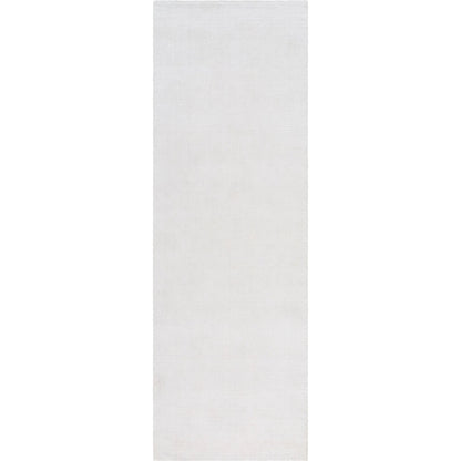 Wilkinson Rug by Livabliss in white. Made from face: 100% polyester, warp: 100% cotton in a coastal style.