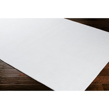 Wilkinson Rug by Livabliss in white. Made from face: 100% polyester, warp: 100% cotton in a coastal style.