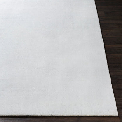 Wilkinson Rug by Livabliss in white. Made from face: 100% polyester, warp: 100% cotton in a coastal style.