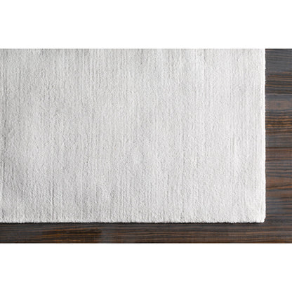 Wilkinson Rug by Livabliss in white. Made from face: 100% polyester, warp: 100% cotton in a coastal style.