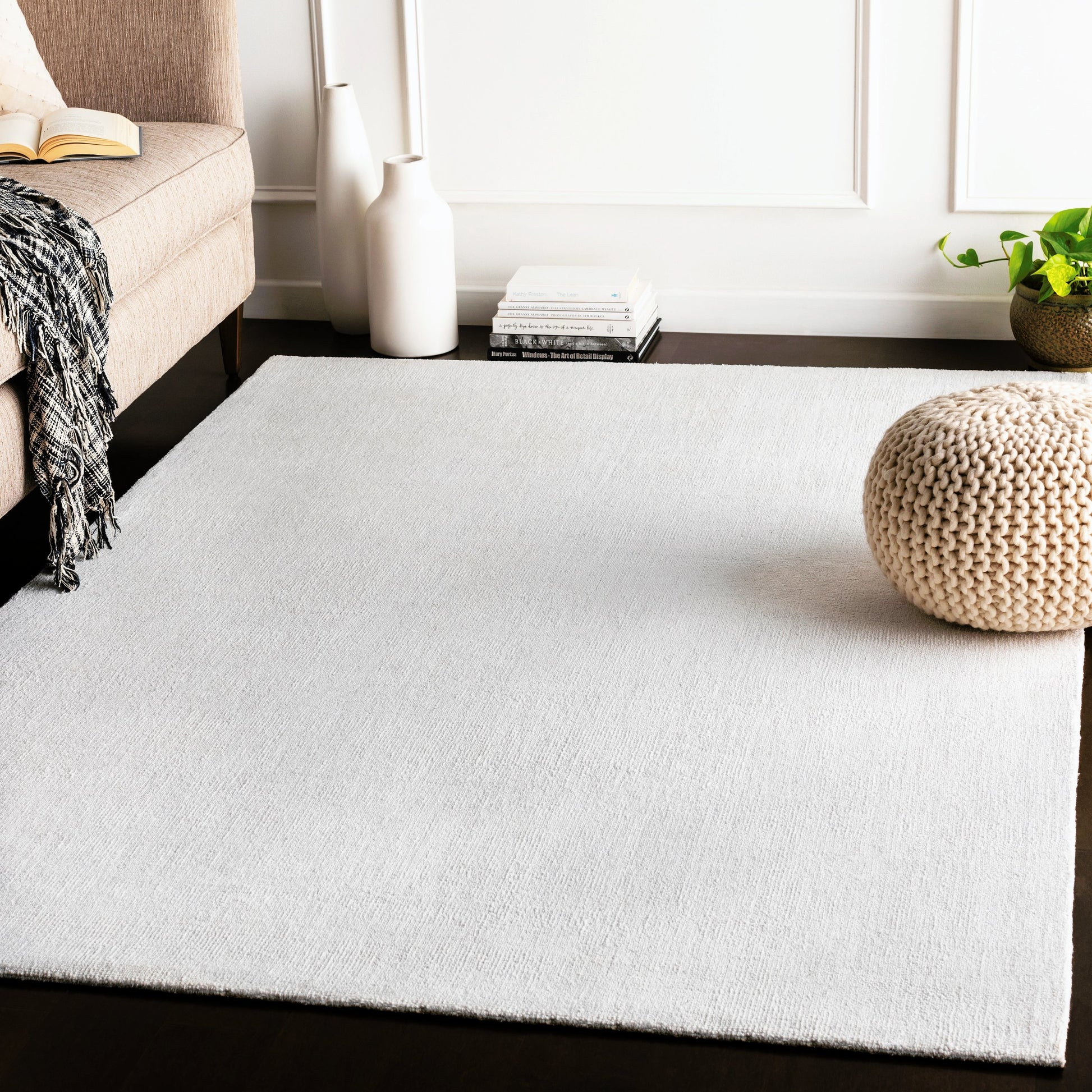 Wilkinson Rug by Livabliss in white. Made from face: 100% polyester, warp: 100% cotton in a coastal style.