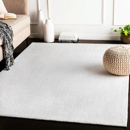Wilkinson Rug by Livabliss in white. Made from face: 100% polyester, warp: 100% cotton in a coastal style.