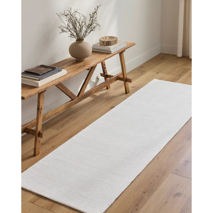 Wilkinson Rug by Livabliss in white. Made from face: 100% polyester, warp: 100% cotton in a coastal style.