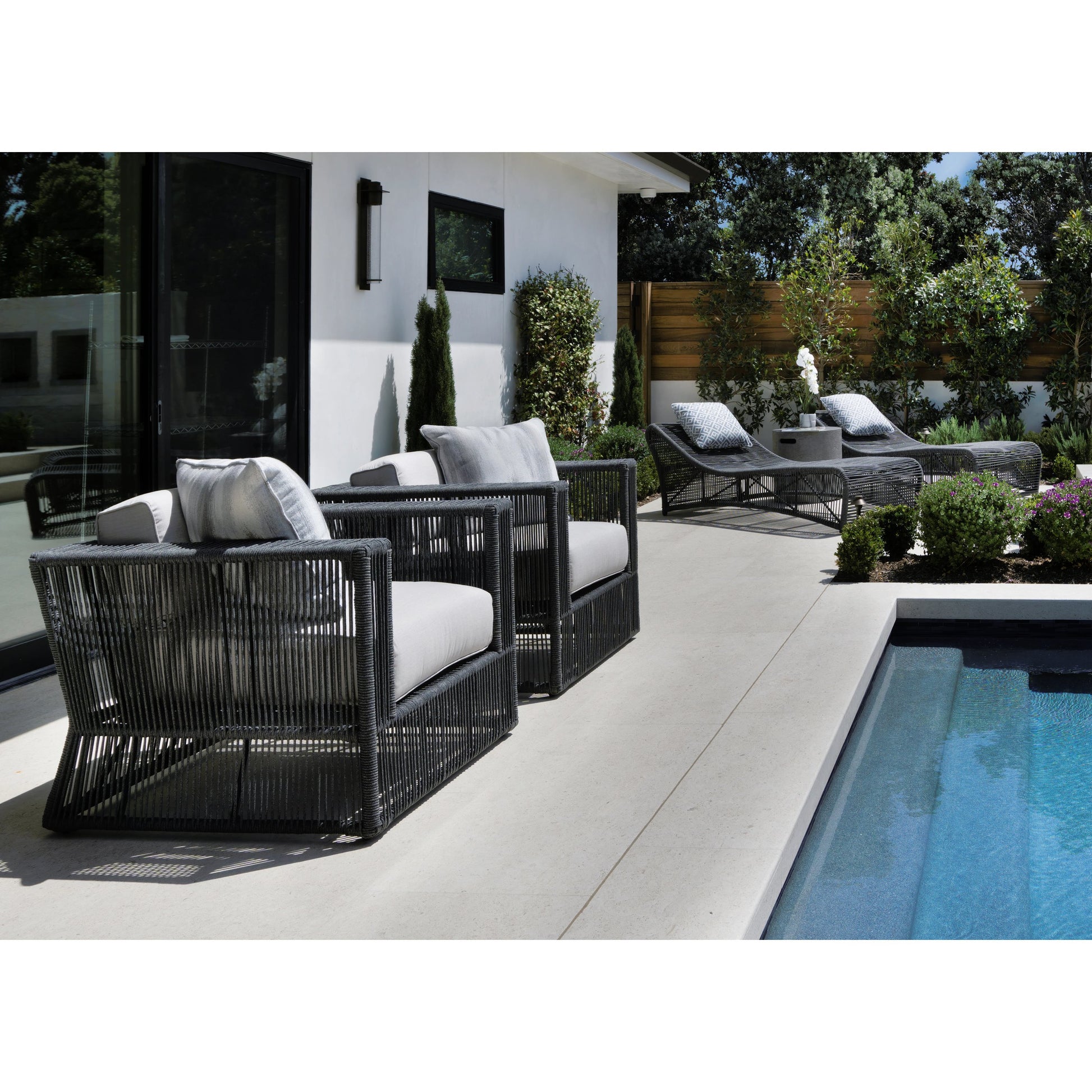 Milano Outdoor Cushionless Chaise by Sunset West in slate. Made from olefin rope in a coastal style.