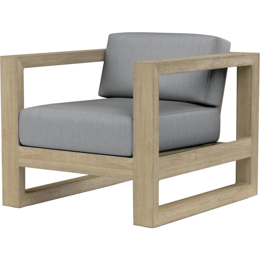 Coastal Outdoor Teak Club Chair by Sunset West. Made from teak in a modern style.