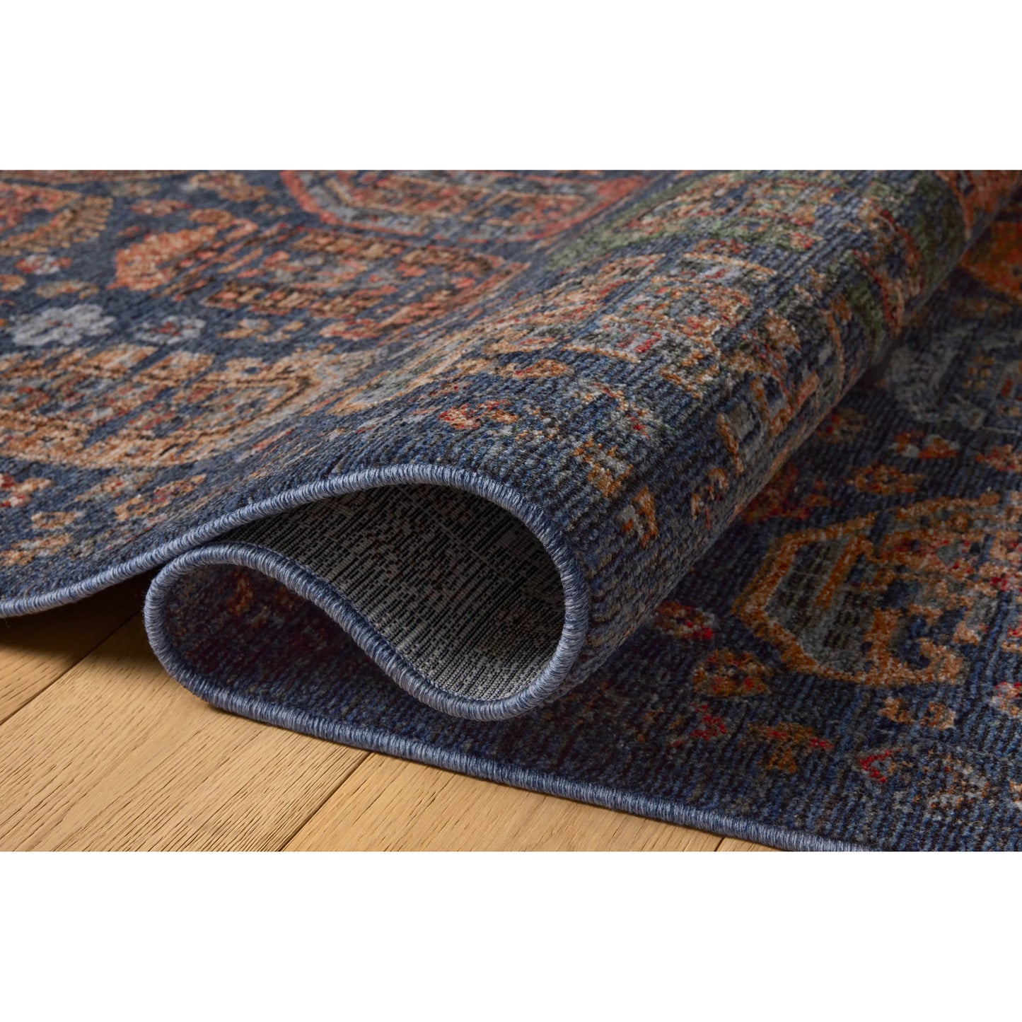 002 SI-2628864,SI-2628865,SI-2628866,SI-2628867,SI-2628868,SI-2628869,SI-2628870,SI-2628871,SI-2628873,SI-2628874,SI-2628875,SI-2628876,SI-2628877 | Closeup | Winchester WNC-04 Rug by Loloi in navy, multi. Made from 100% polyester in a unique style.