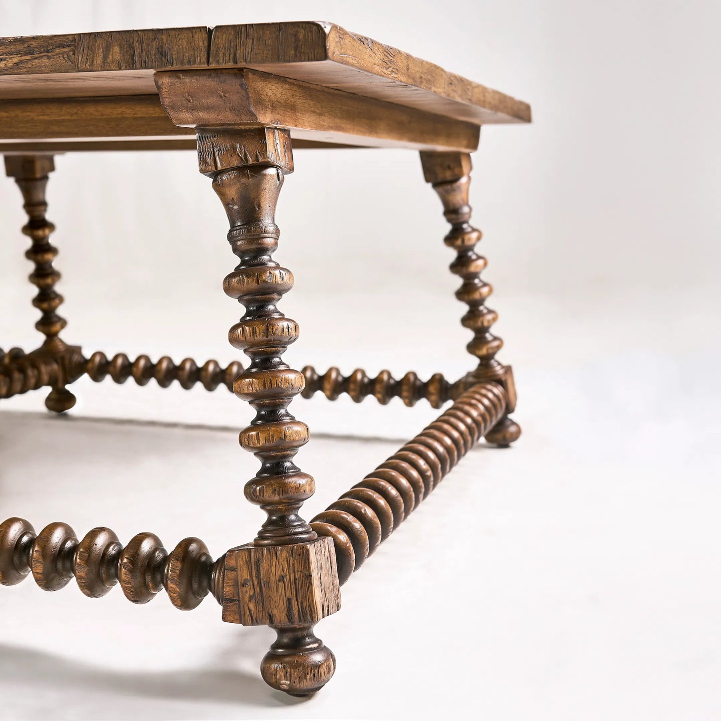 008 SI-2462644 | Closeup | Tamarisk Cocktail Table by Jonathan Charles in medium spain walnut. Made from acacia in a traditional style.