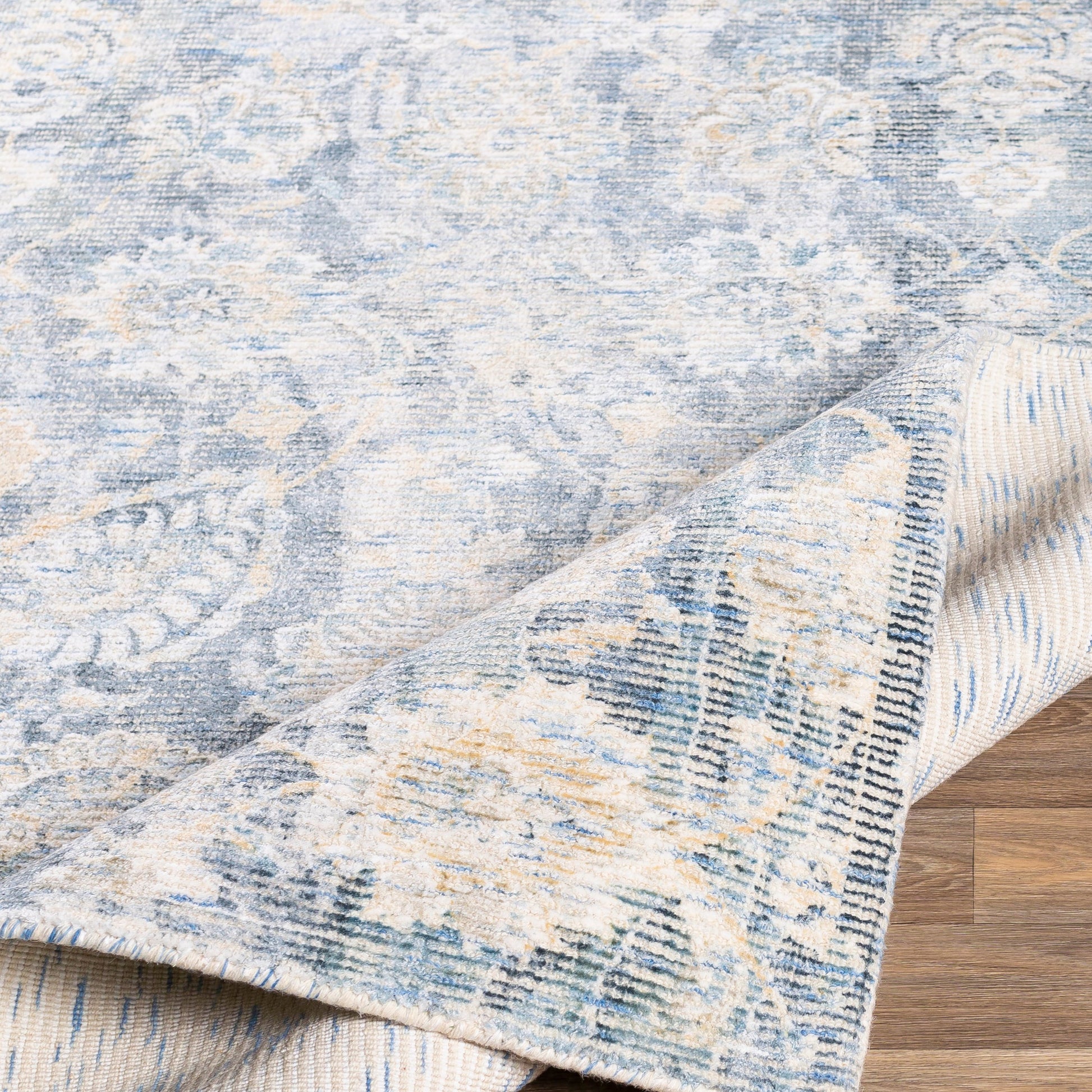 Wilson Rug - 24553 by Surya. Made from 55% viscose, 45% wool in a unique style.