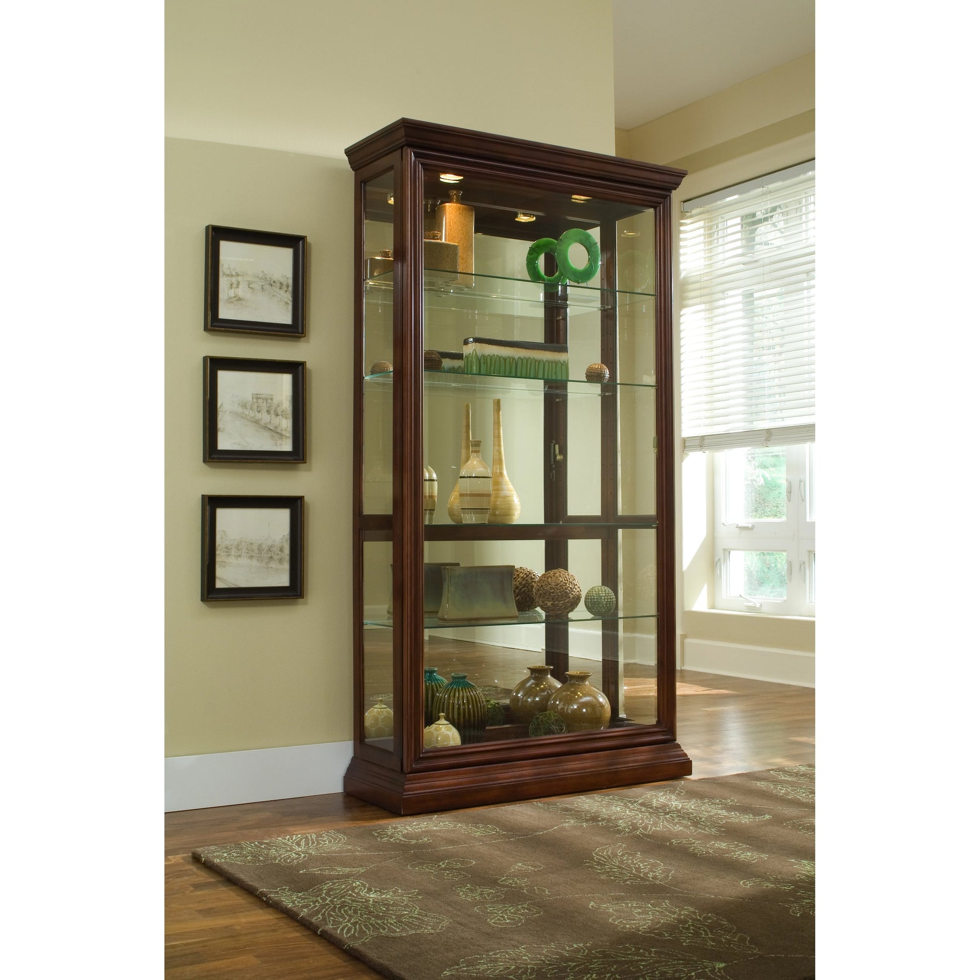 43'' Wide Two Way Sliding Door Curio Display Cabinet in Warm Brown by Pulaski Furniture in warm mid-tone. Made from hardwood solids in a traditional style.