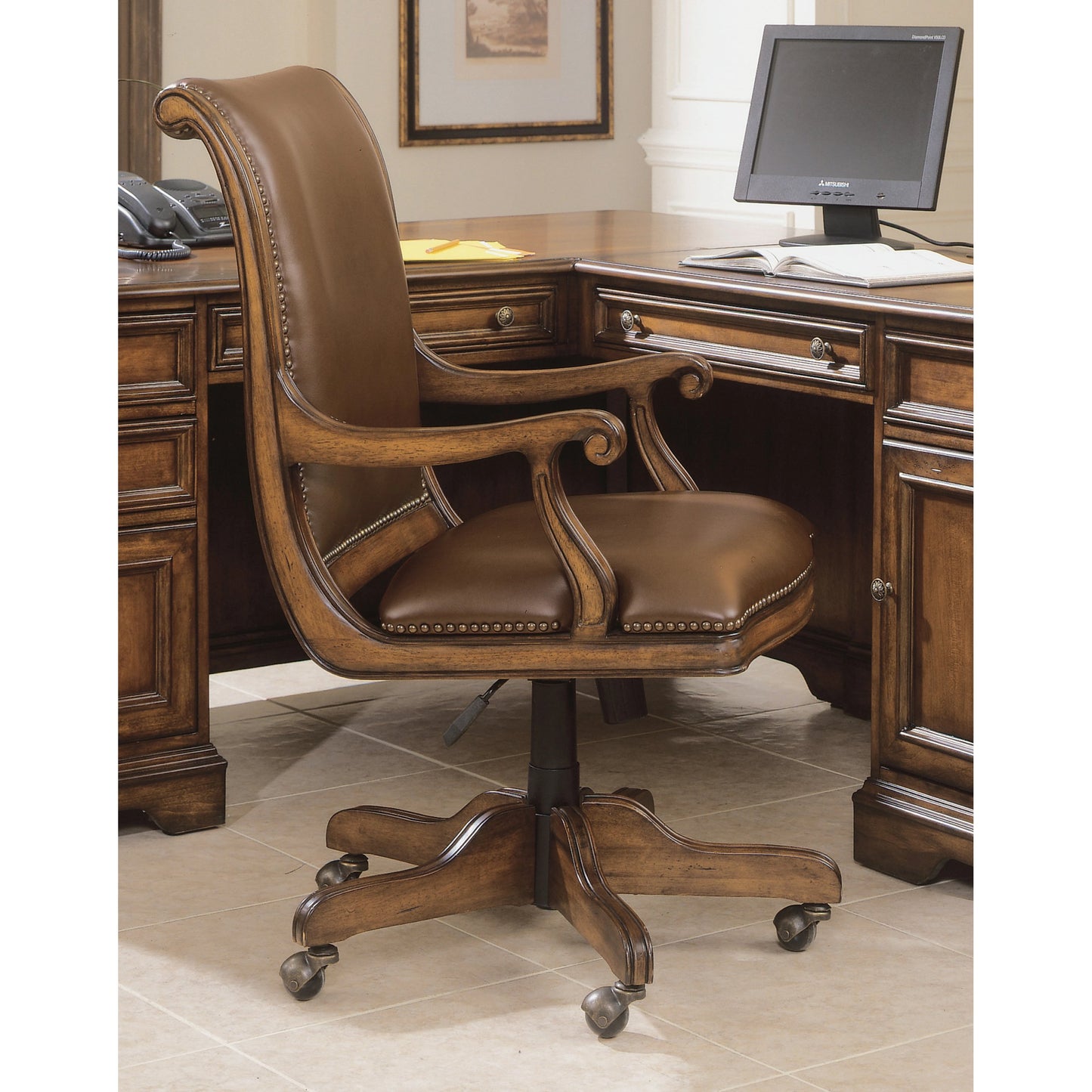 004 SI-1748476 | Lifestyle | Brookhaven Desk Chair by Hooker Furniture in brown and cherry. Made from cherry veneers with split grain leather in a transitional style.
