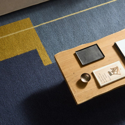Woven Construct​ WVC02 Rug by Jaipur Living in blue, yellow, gold. Made from 65% wool 35% cotton in a unique style.