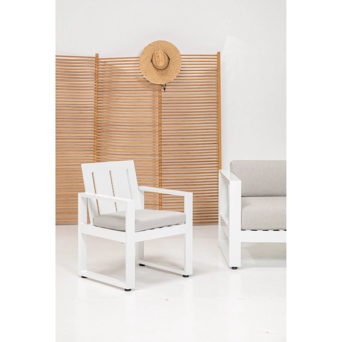 006 SI-2514003 | Lifestyle | Newport Outdoor Dining Chair by Sunset West in whites/creams/beiges. Made from aluminum in a modern style.