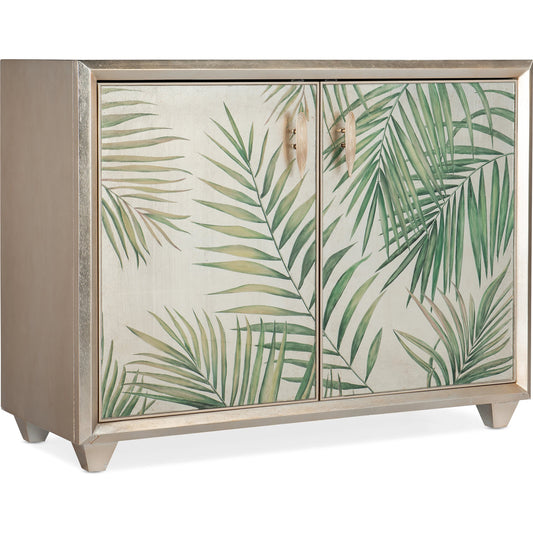 Melange Let's Be Fronds Two Door Chest by Hooker Furniture in gold leaf. Made from wood, glass in a coastal style.